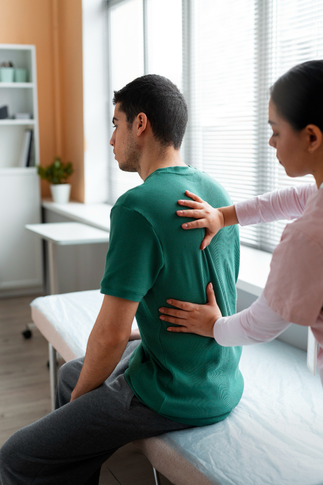 Back pain specialist performing patient evaluation in McLean clinic for accurate diagnosis and treatment planning